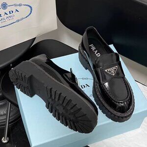 Prada Elegant Black Leather Loafers